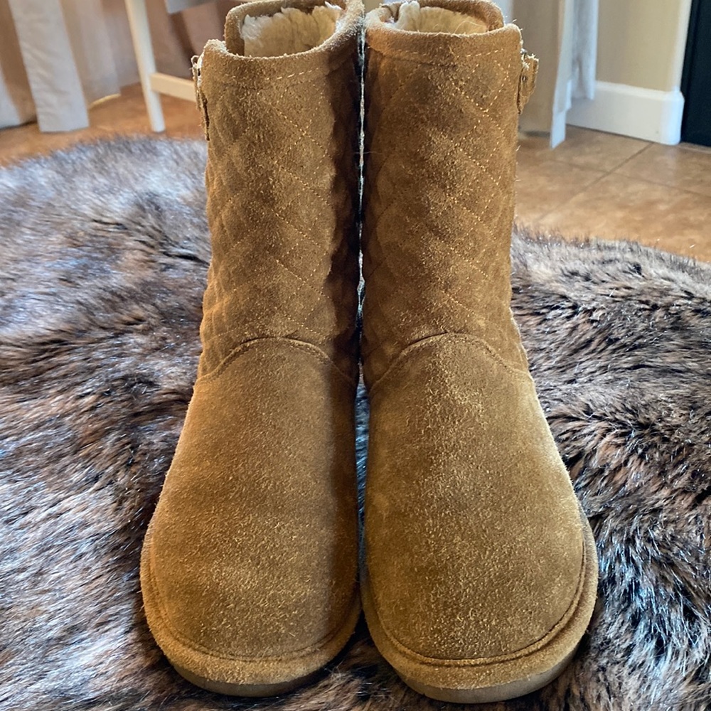 A pair of BearPaw slip-ons.